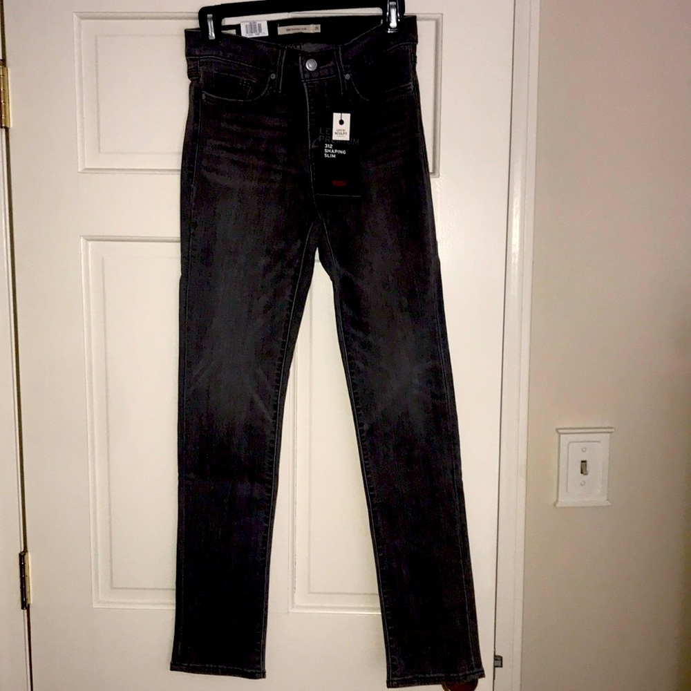 New with tags, grey Levi jeans.